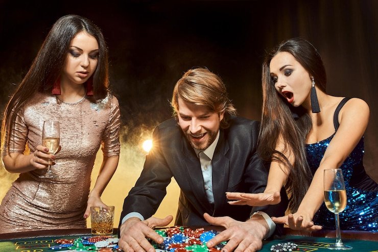 Phoenix Rises slot interface on mobile device showing five reels and paytable